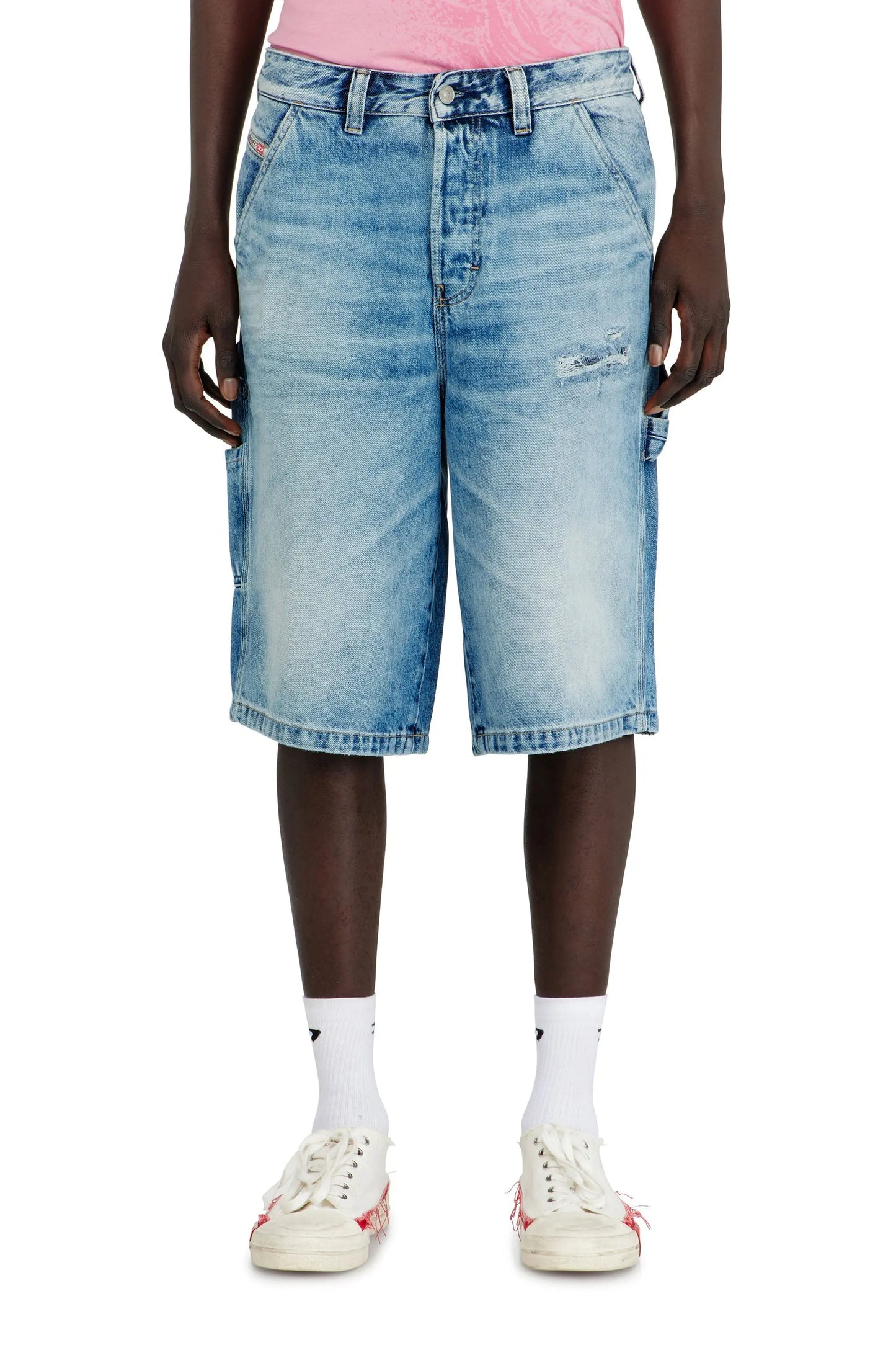 Relaxed shorts in fluid denim with abrasions