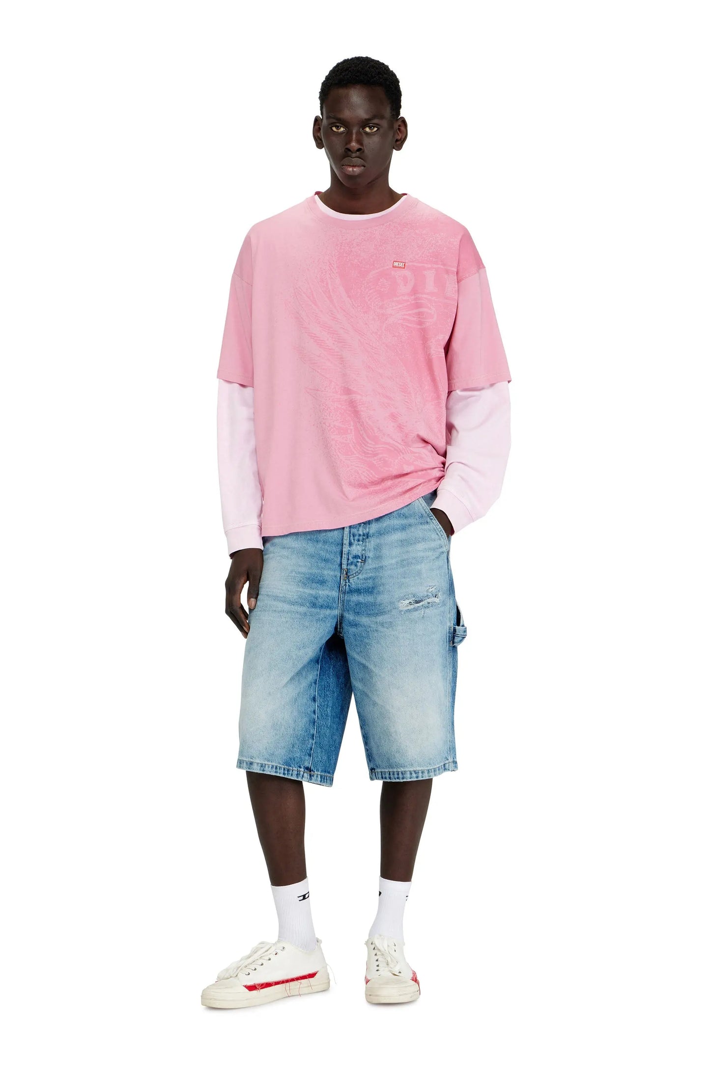 Relaxed shorts in fluid denim with abrasions
