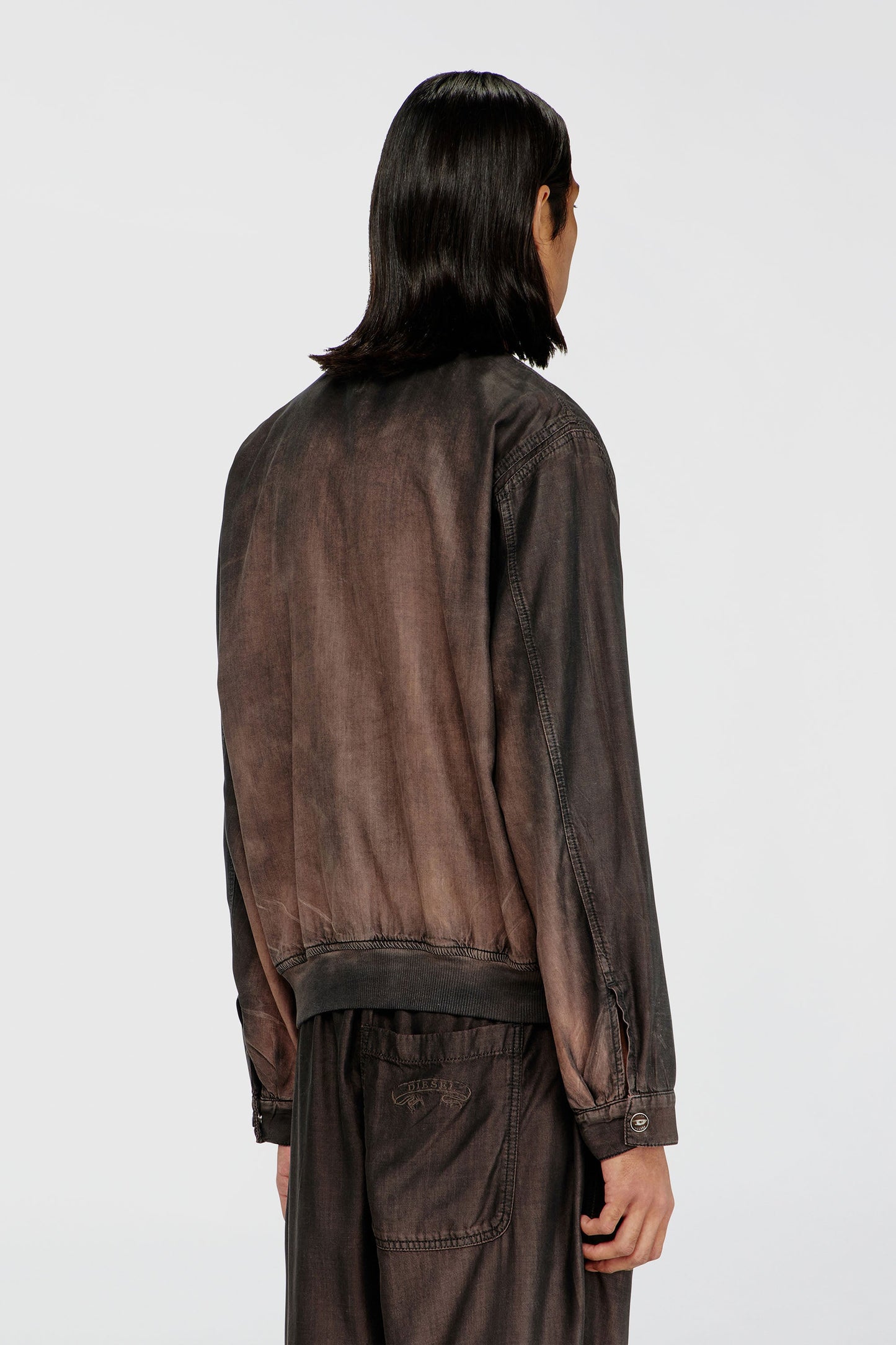 Bomber jacket in fluid coated denim