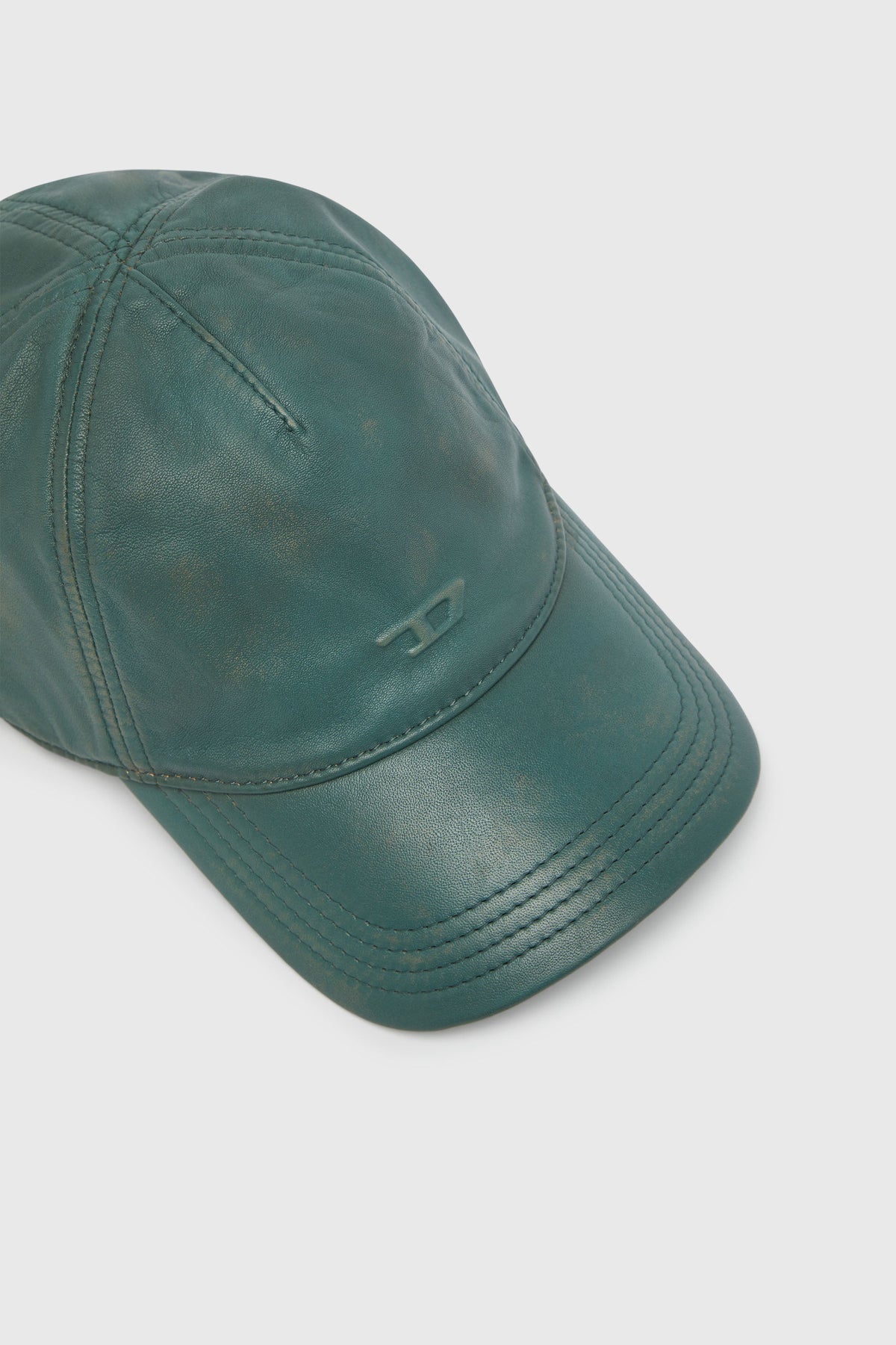 Baseball cap in treated leather