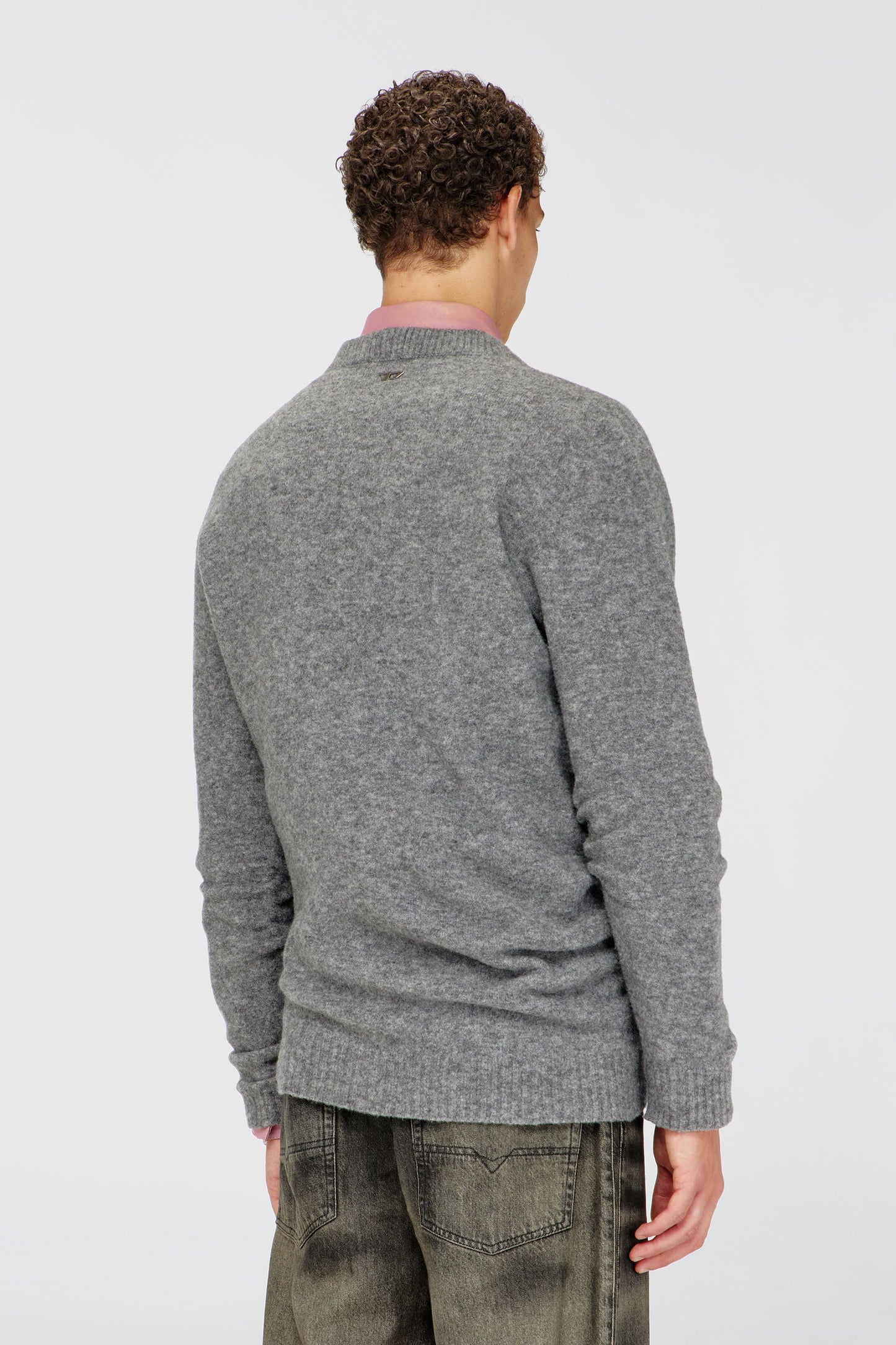 V-neck jumper in wrinkled boiled knit