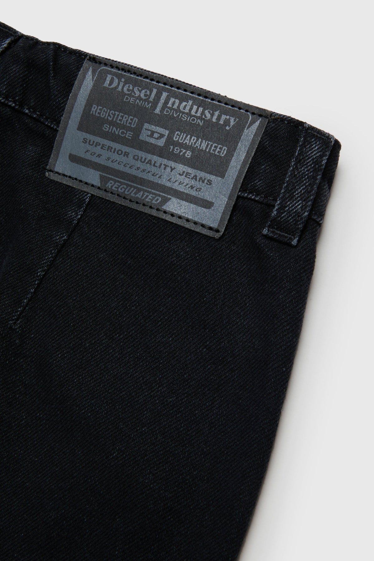 Denim mini skirt with curved hem