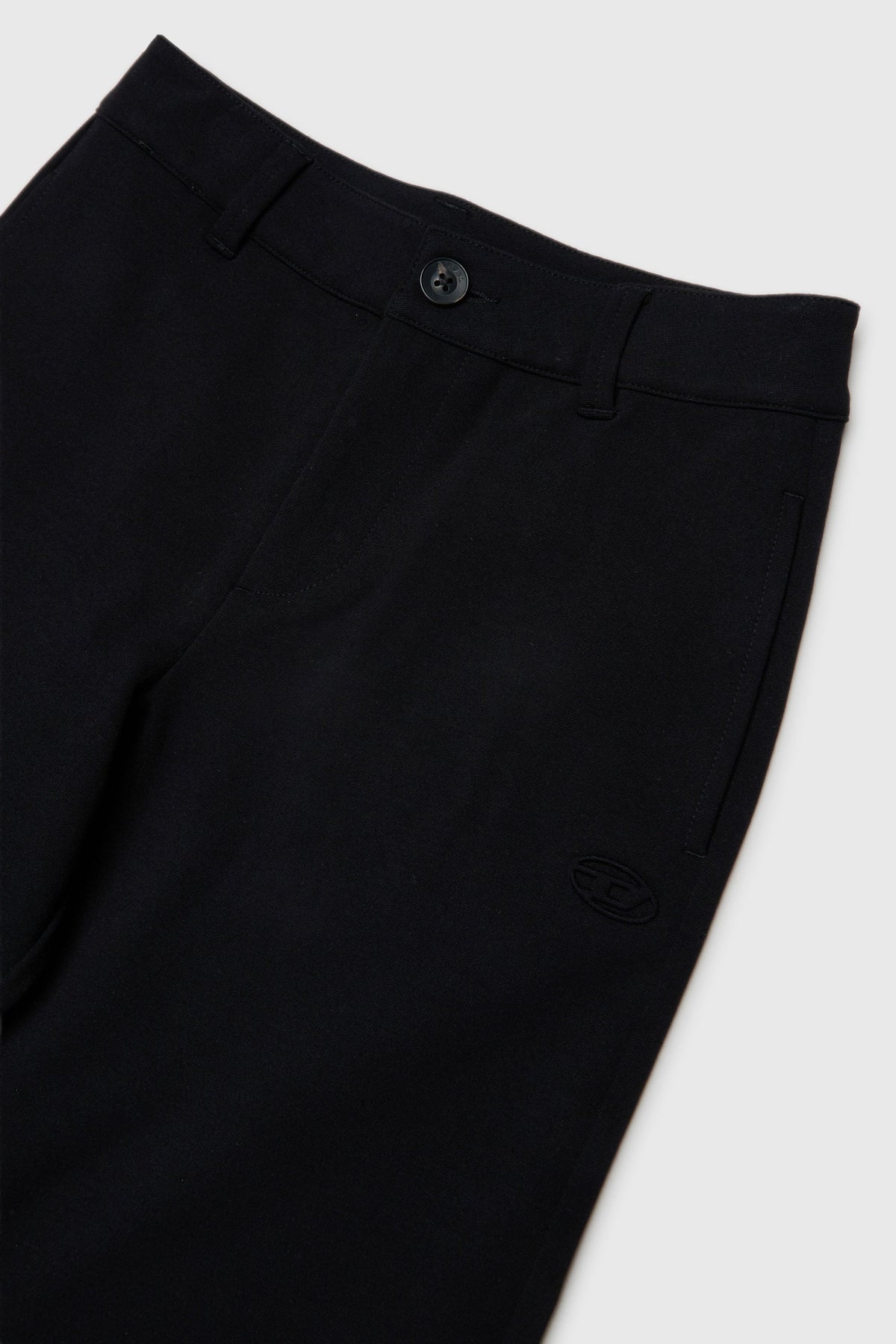 Flared pants in compact stretch fabric